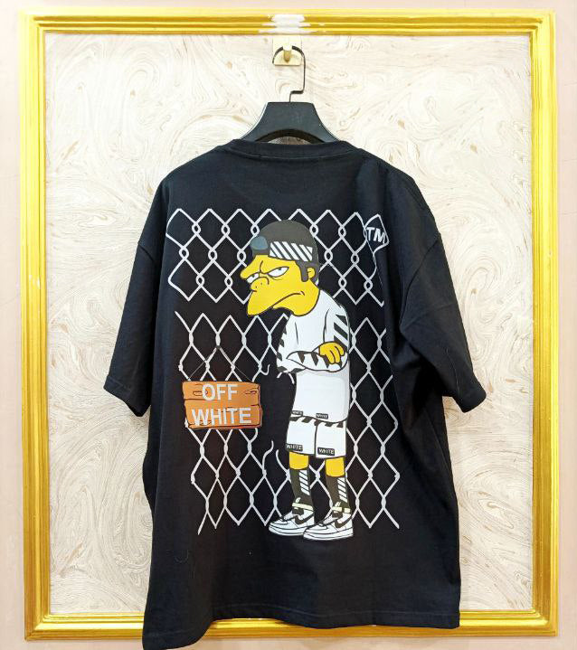 Black t-shirt with "Off-White™" design on a hanger against a decorative wall.