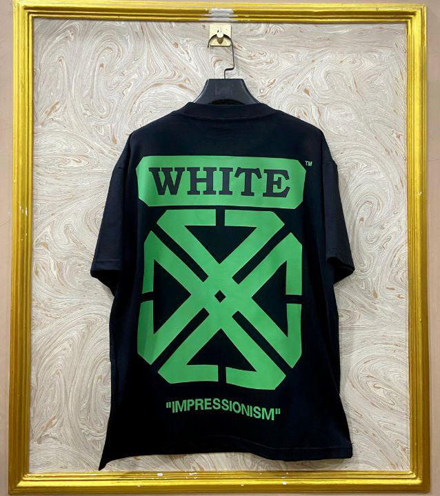 Black t-shirt with "Off-White™" design on a hanger against a decorative wall.