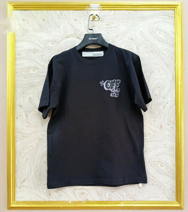 Black t-shirt with "Off-White™" logo on a hanger against a marble wall.