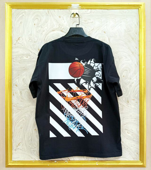 Black t-shirt with "Off-White™" design on a hanger against a decorative wall.