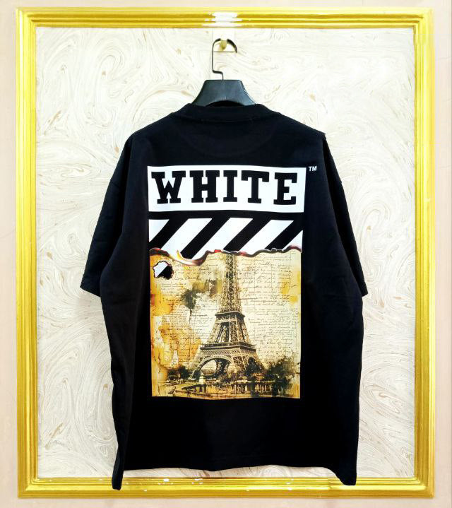 Black t-shirt with "Off-White™" design on a hanger against a decorative wall.