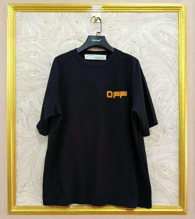 Black t-shirt with "Off-White™" logo on a hanger against a marble wall.