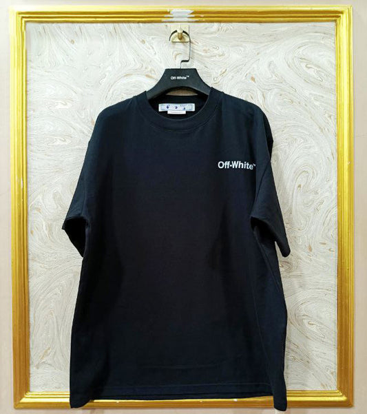 Black t-shirt with "Off-White™" logo on a hanger against a marble wall.