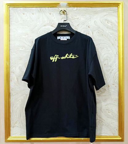 Black t-shirt with "Off-White™" logo on a hanger against a marble wall.