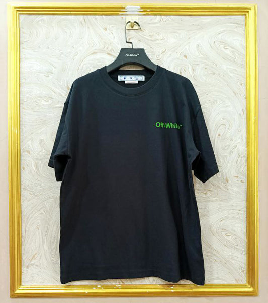 Black t-shirt with "Off-White™" logo on a hanger against a marble wall.