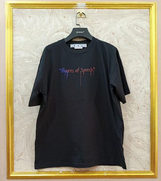 Black t-shirt with "Off-White™" logo on a hanger against a marble wall.
