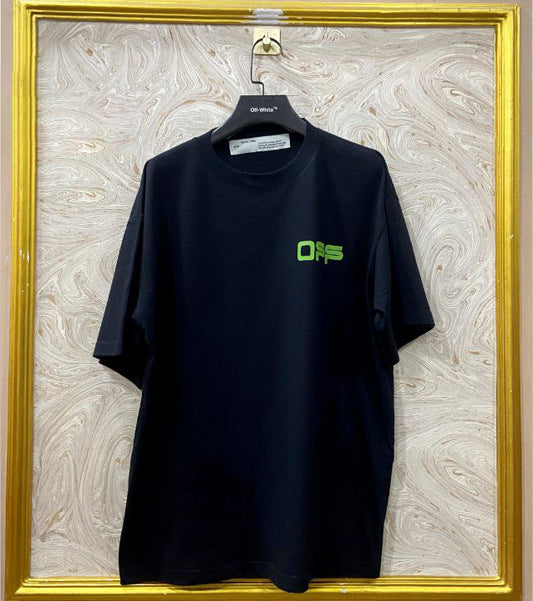 Black t-shirt with "Off-White™" logo on a hanger against a marble wall.