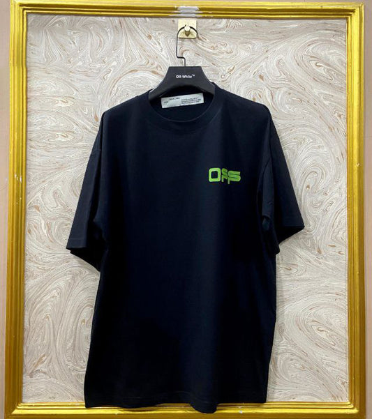 Black t-shirt with "Off-White™" logo on a hanger against a marble wall.