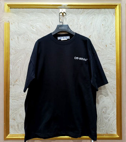 Black t-shirt with "Off-White™" logo on a hanger against a marble wall.
