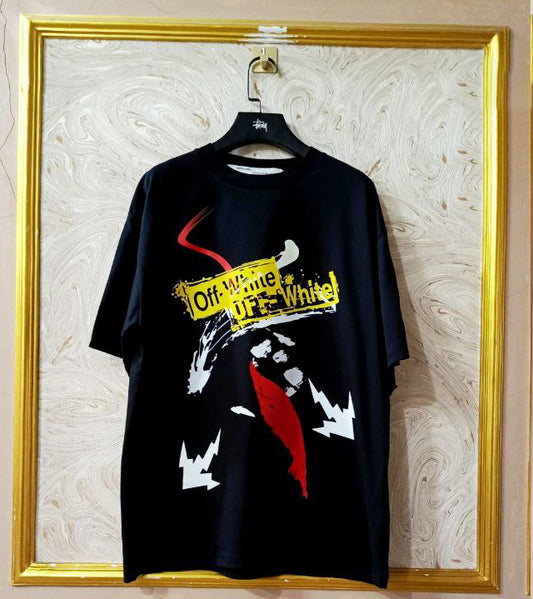Black t-shirt with "Off-White™" logo on a hanger against a marble wall.
