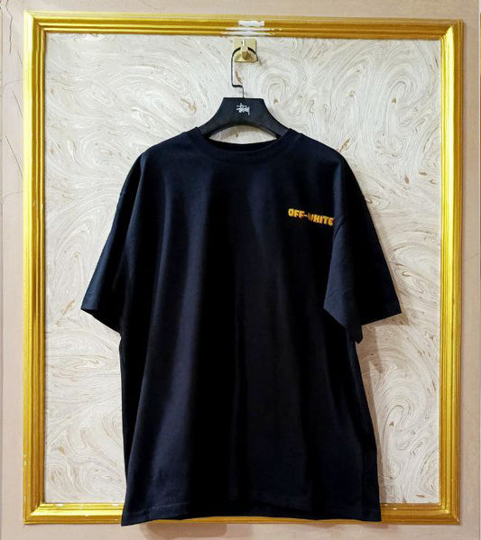 Black t-shirt with "Off-White™" logo on a hanger against a marble wall.