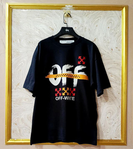 Black t-shirt with "Off-White™" logo on a hanger against a marble wall.