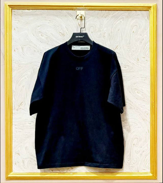 Black oversized t-shirt inspired by Off-White with “OFF” front logo, displayed on hanger in gold frame.