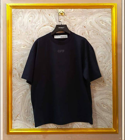 Black oversized t-shirt inspired by Off-White with “OFF” front logo, displayed on hanger in gold frame.