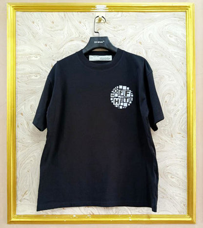 Black t-shirt with "Off-White™" logo on a hanger against a marble wall.
