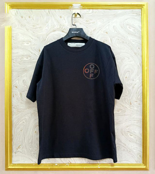 Black t-shirt with "Off-White™" logo on a hanger against a marble wall.