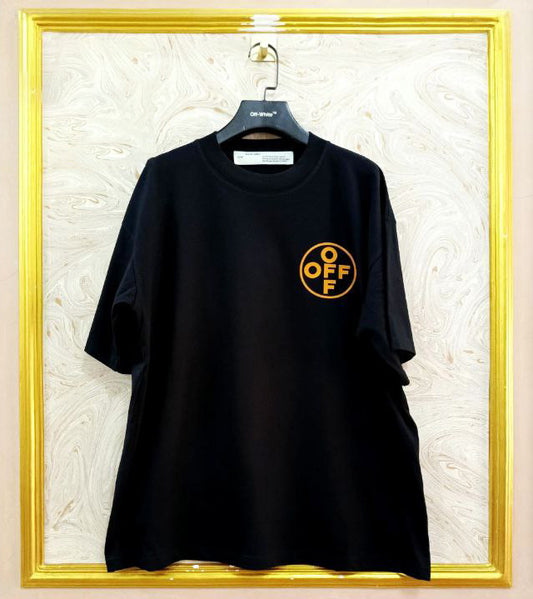 Black t-shirt with "Off-White™" logo on a hanger against a marble wall.