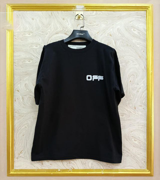 Black t-shirt with "Off-White™" logo on a hanger against a marble wall.