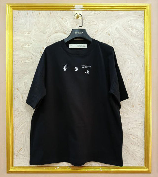 Black t-shirt with "Off-White™" logo on a hanger against a marble wall.