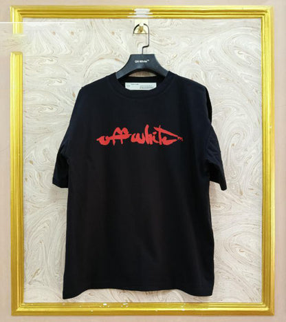 Black t-shirt with "Off-White™" logo on a hanger against a marble wall.