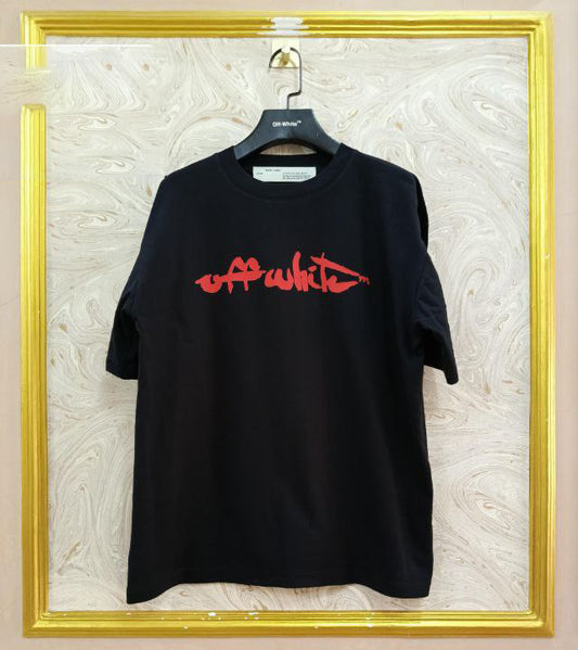 Black t-shirt with "Off-White™" logo on a hanger against a marble wall.