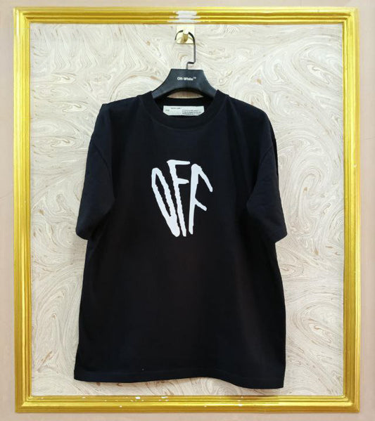 Black t-shirt with "Off-White™" logo on a hanger against a marble wall.