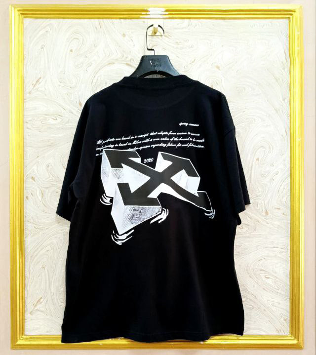 Black t-shirt with "Off-White™" logo on a hanger against a marble wall.