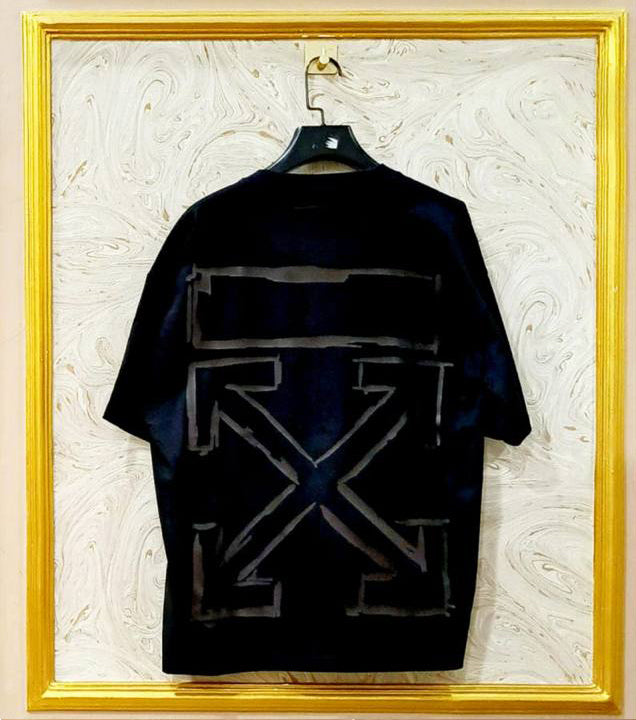 Black Off-White style t-shirt back with “WHITE” print and diagonal lines.