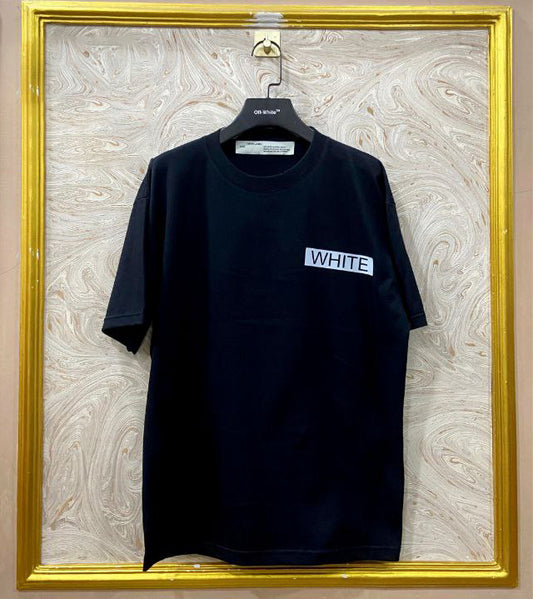 Black t-shirt with "Off-White™" logo on a hanger against a marble wall.
