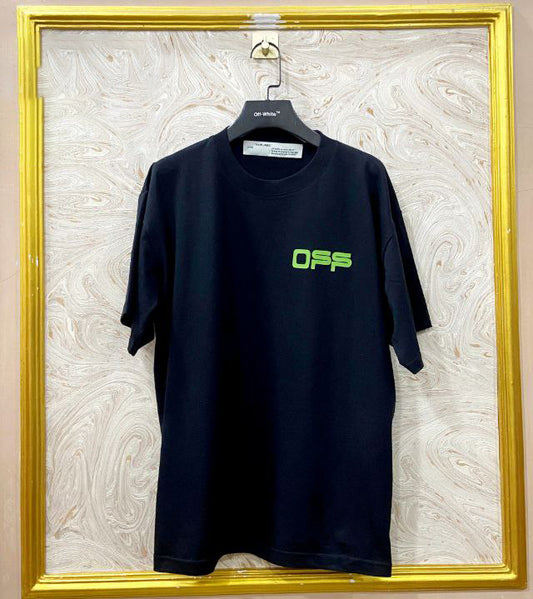 Black t-shirt with "Off-White™" logo on a hanger against a marble wall.