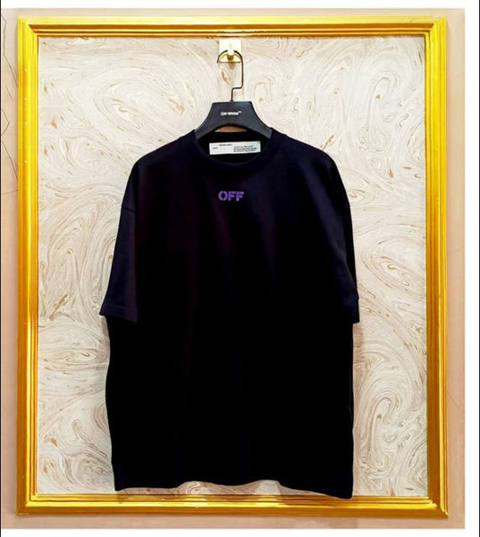 Black oversized t-shirt inspired by Off-White with “OFF” front logo, displayed on hanger in gold frame.
