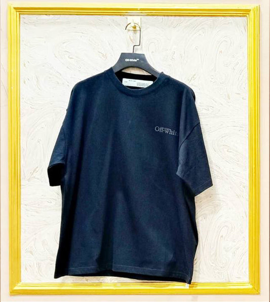 Black oversized t-shirt inspired by Off-White with “OFF” front logo, displayed on hanger in gold frame.