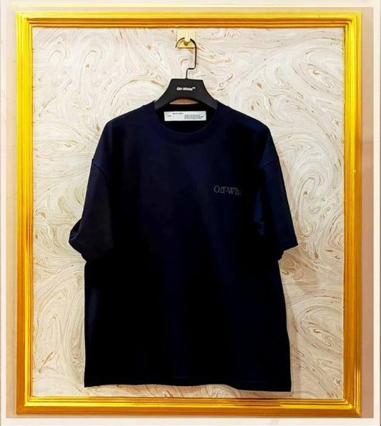 Black oversized t-shirt inspired by Off-White with “Off-White™” front logo, displayed on hanger in gold frame.