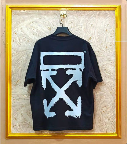 Black t-shirt with a light blue logo on a marble wall background