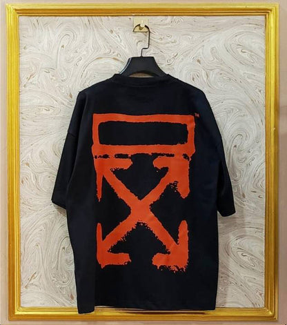 Black Off-White style t-shirt back with “ORANGE” print and diagonal lines.
