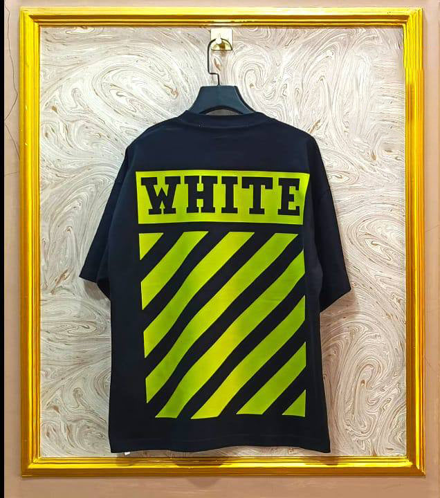 Black t-shirt with yellow and black diagonal stripes and 'WHITE' text, framed by a gold border.
