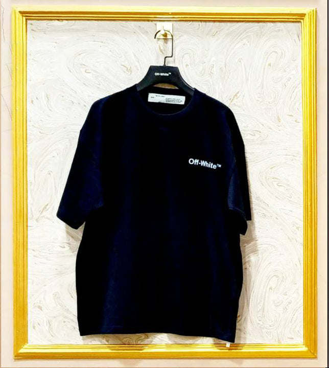Black oversized t-shirt inspired by Off-White with “OFF” front logo, displayed on hanger in gold frame.