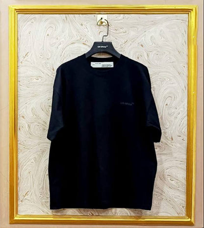 Black oversized t-shirt inspired by Off-White with “Off-White™” front logo, displayed on hanger in gold frame.