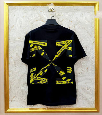 Black Off-White style t-shirt back with “YELLOW” print and diagonal lines.