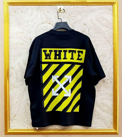 Black t-shirt with "Off-White™" design on a hanger against a decorative wall.