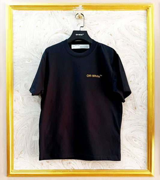 Black t-shirt with "Off-White™" logo on a hanger against a marble wall.