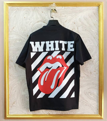 Black shirt with Rolling Stones logo and 'White' text on a textured wall background
